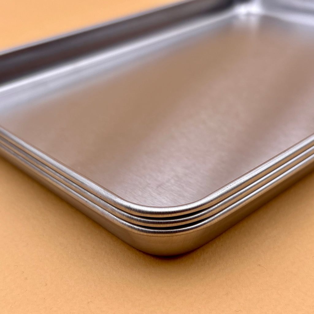 Stackable stainless steel trays